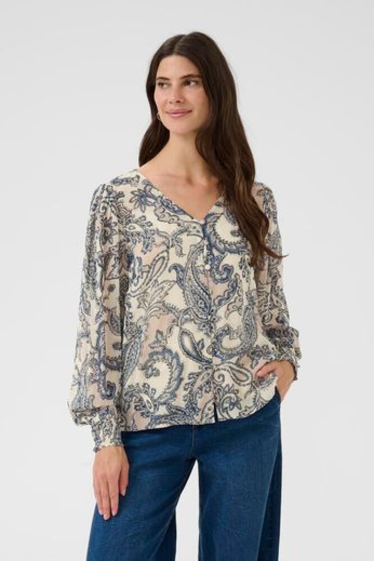Blouse with a relaxed fit, long sleeves, and V-neckline.