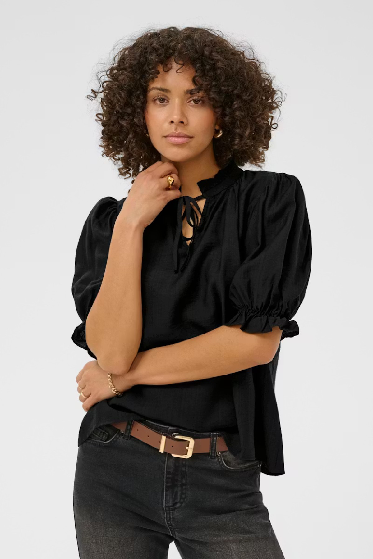 Short sleeves blouse, It features a high ruffled neckline with  tie detail at the front.