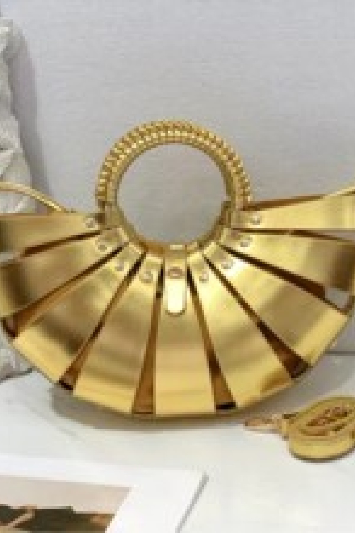 Metallic gold crossbody handbag