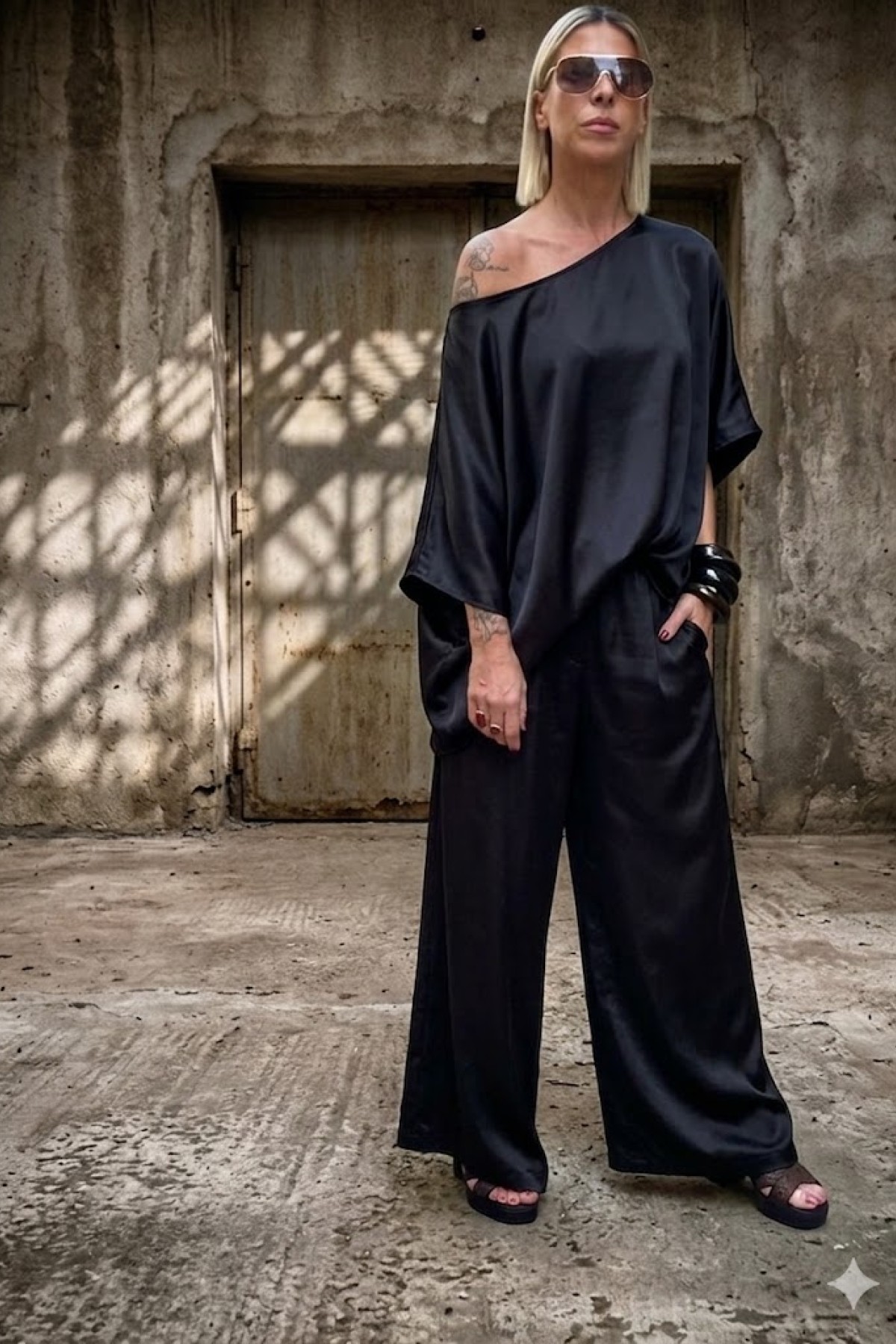 Loose fit pants with elastic waist band.  Wear it with the matching top