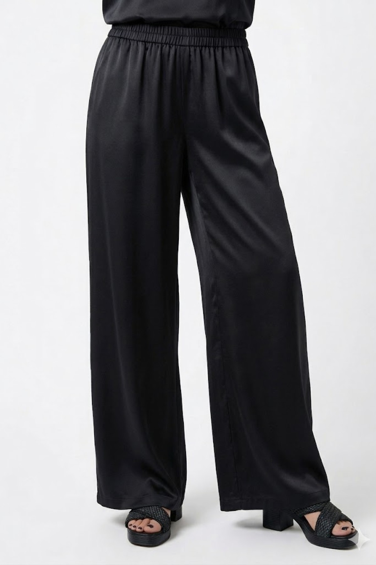 Loose fit pants with elastic waist band.  Wear it with the matching top
