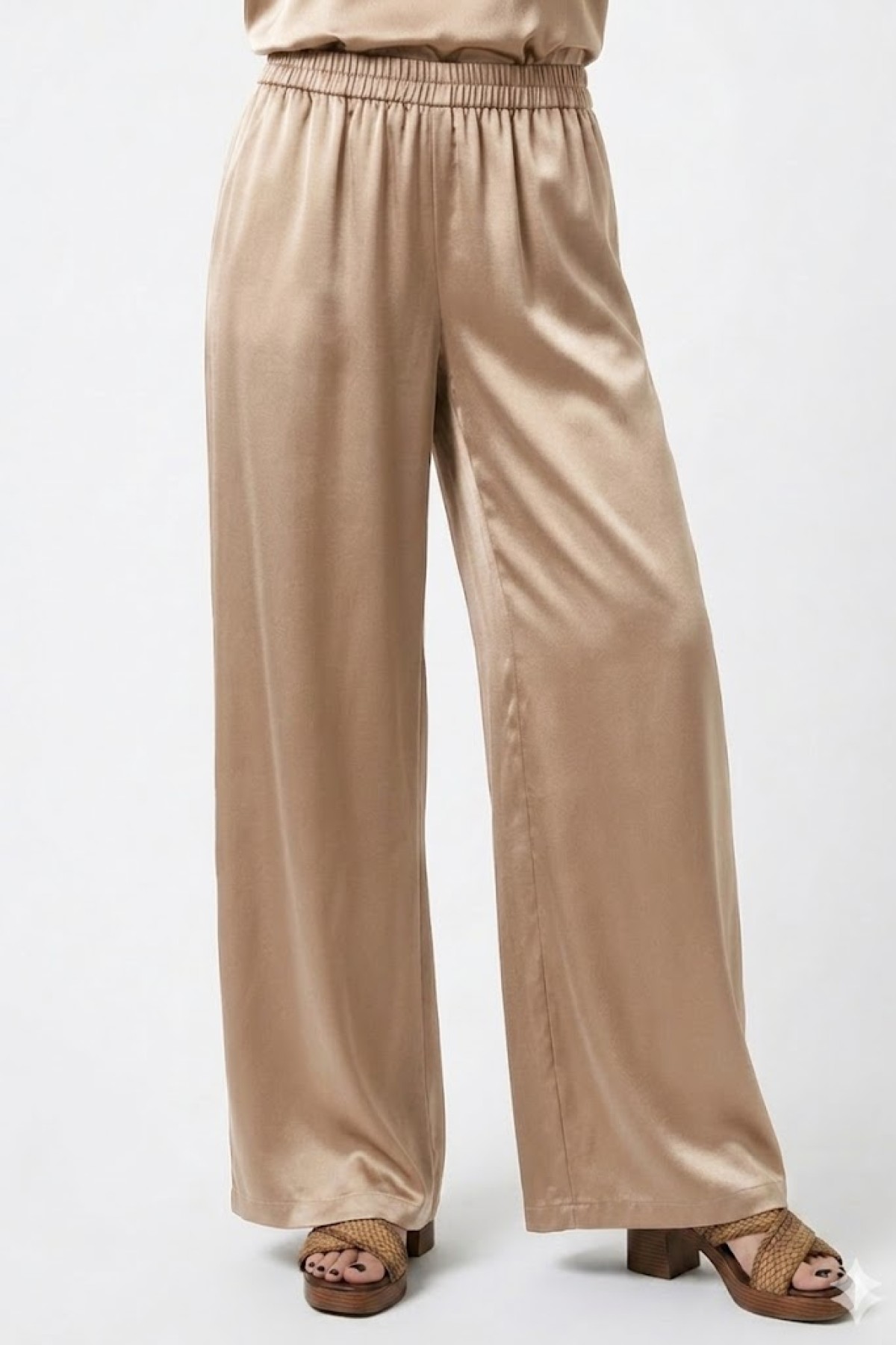Loose fit pants with elastic waist band.  Wear it with the matching top