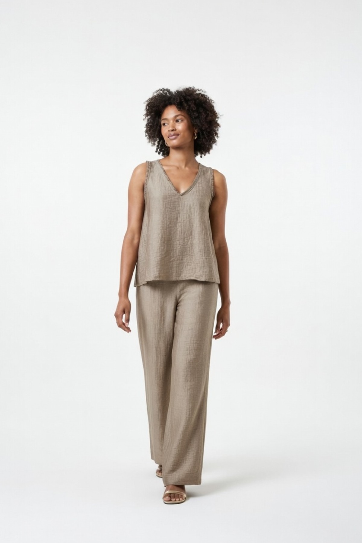 V-neck top with sleeveless.  Wear it with the matching pants