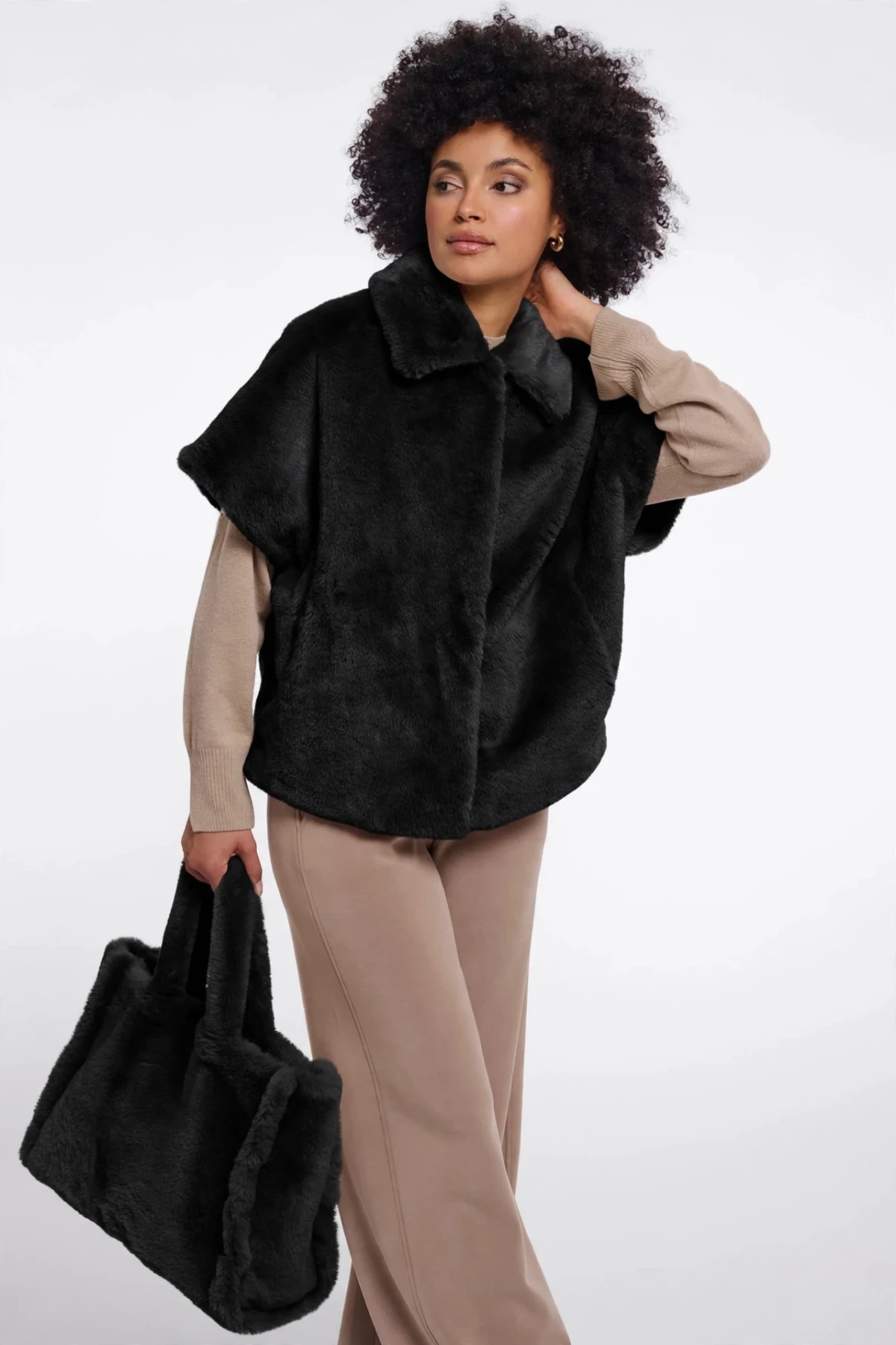 Faux fur gilet / cape vest.