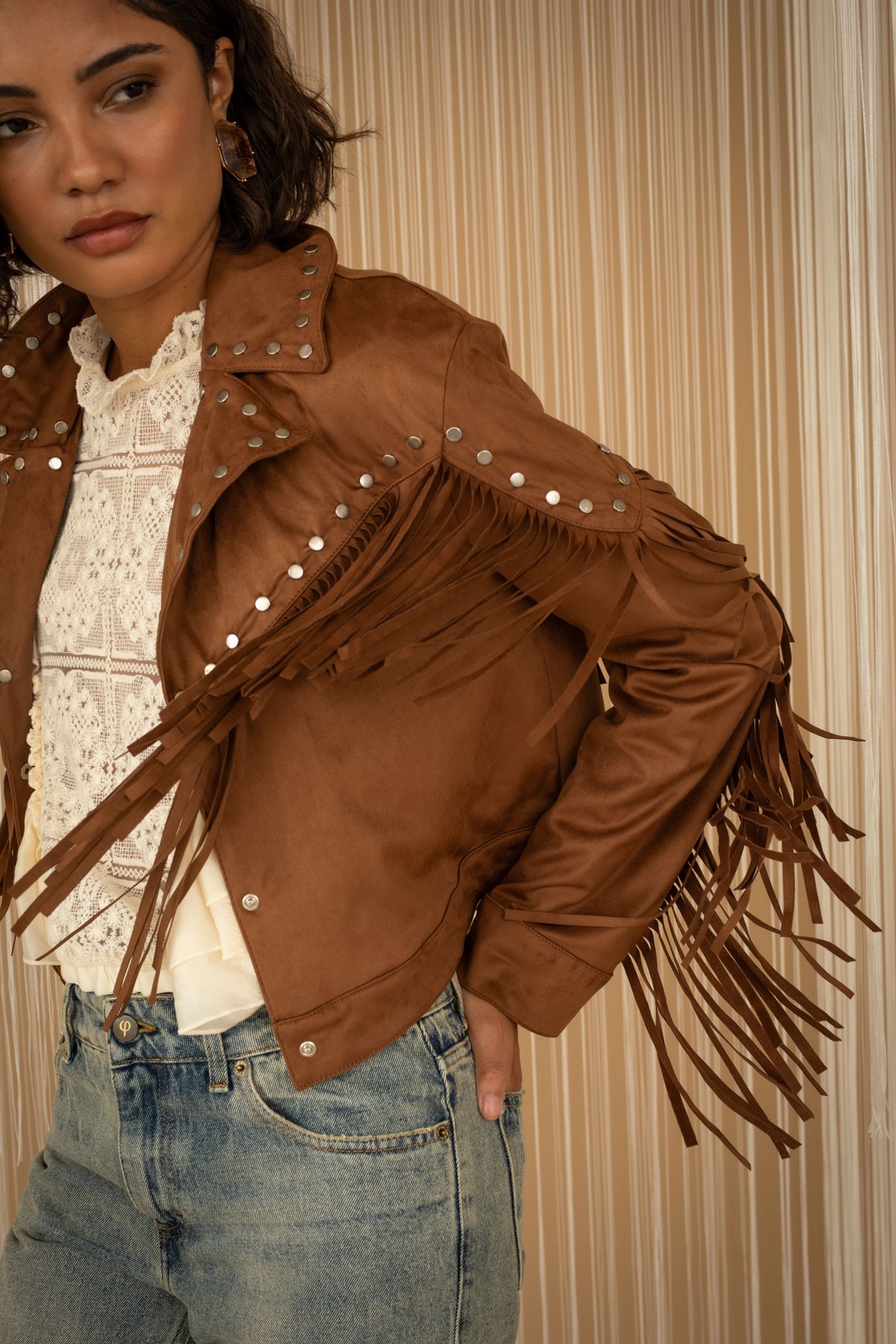Jacket with fringes and studs