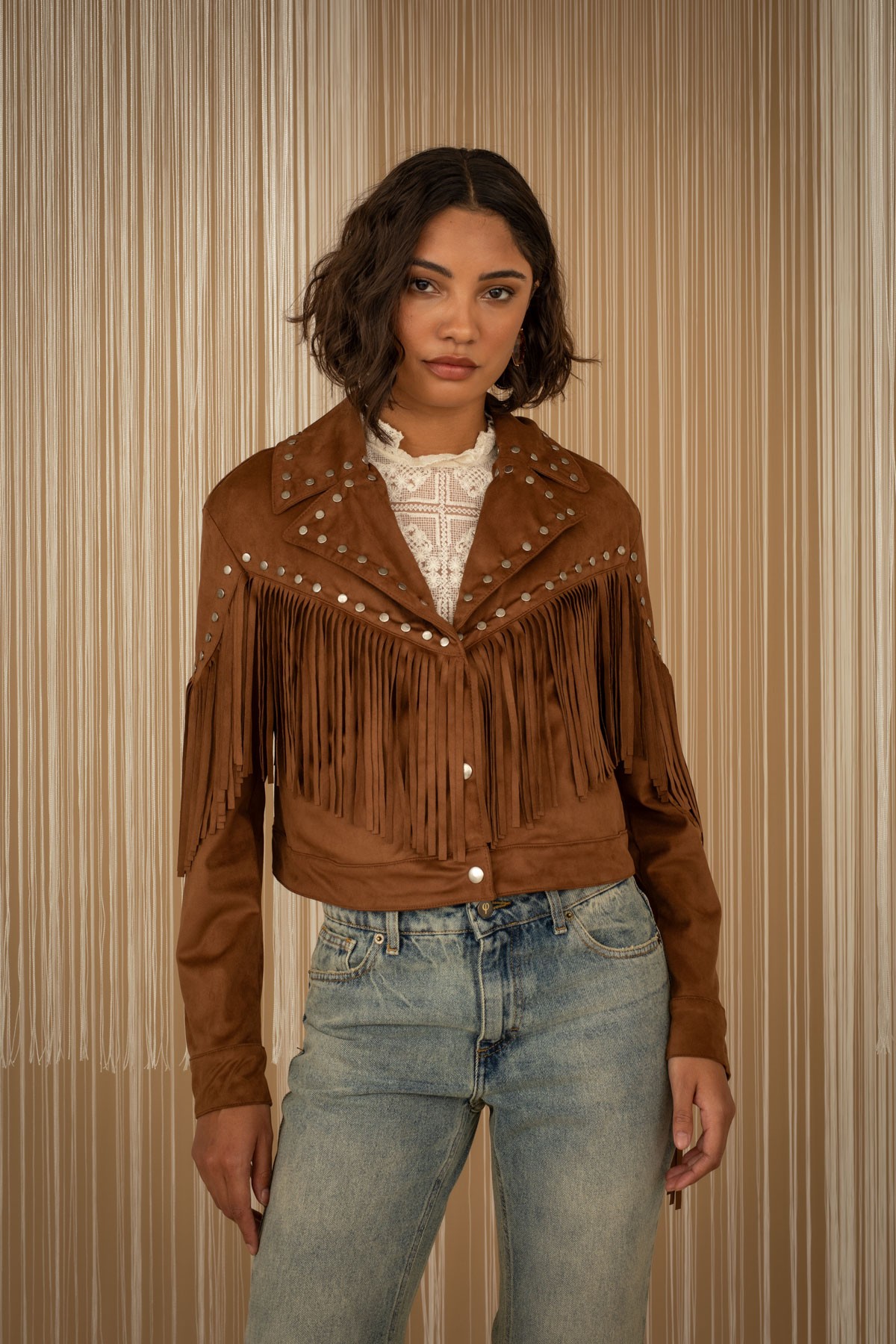 Jacket with fringes and studs