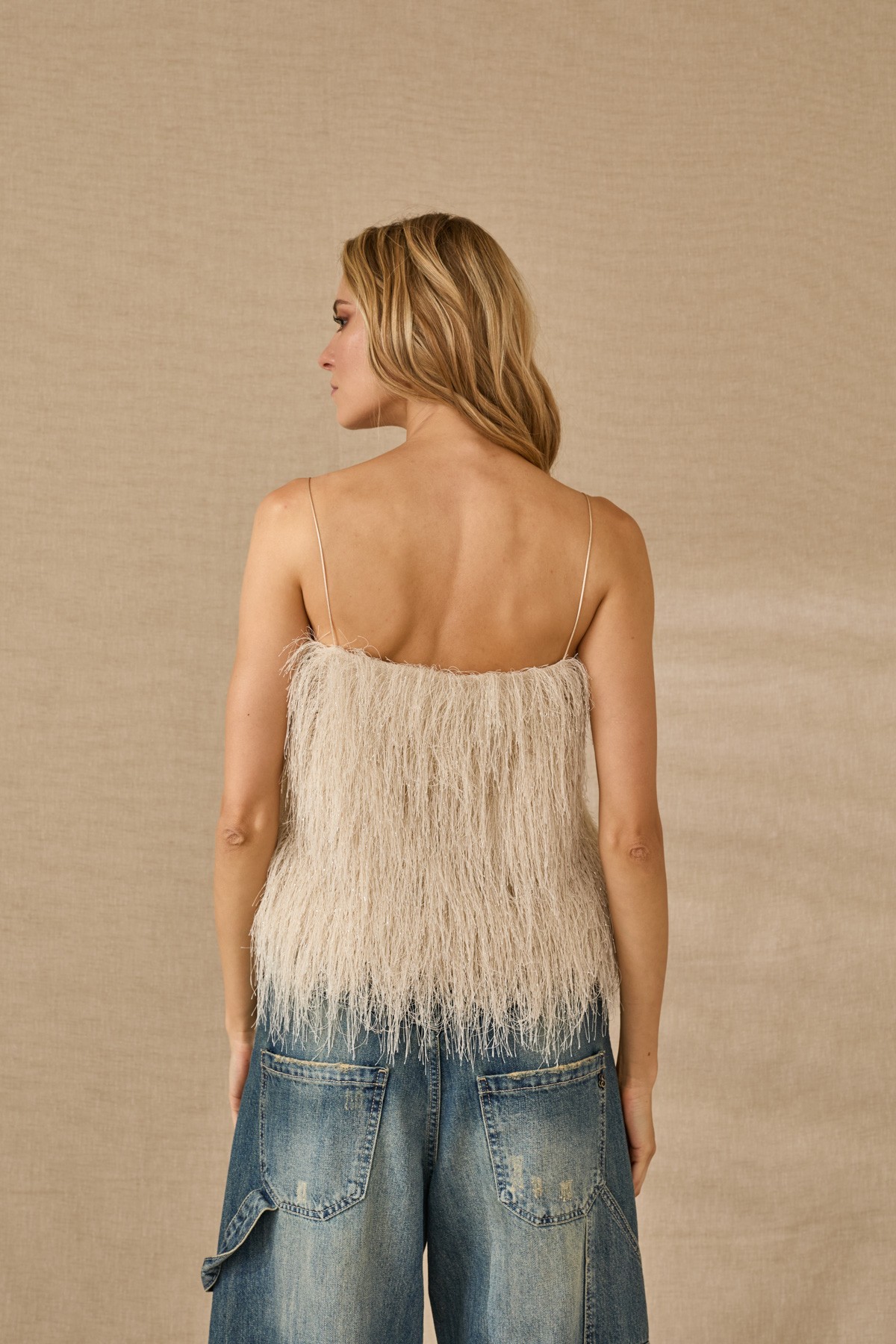 A striking fringed top.