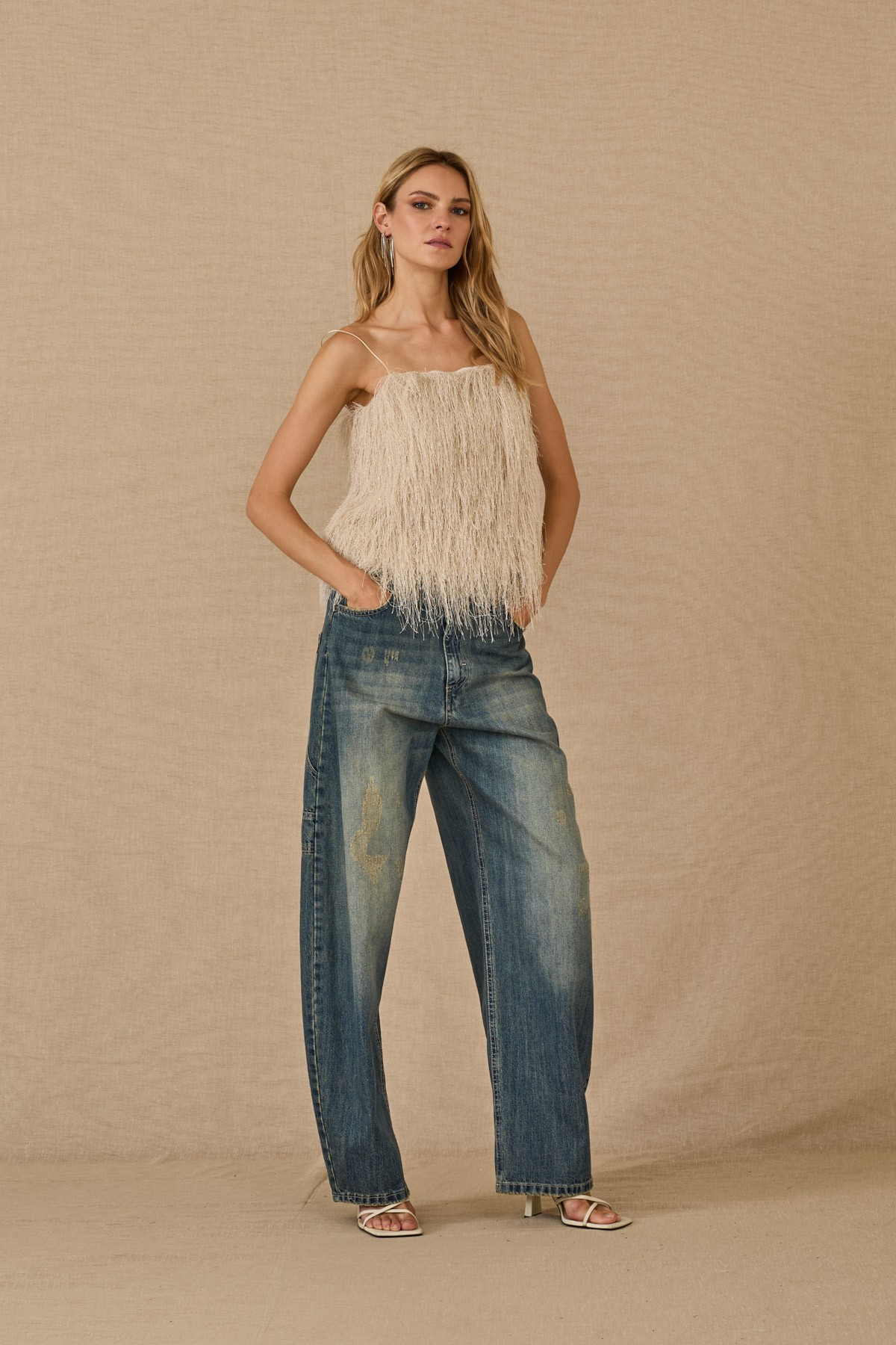 A striking fringed top.