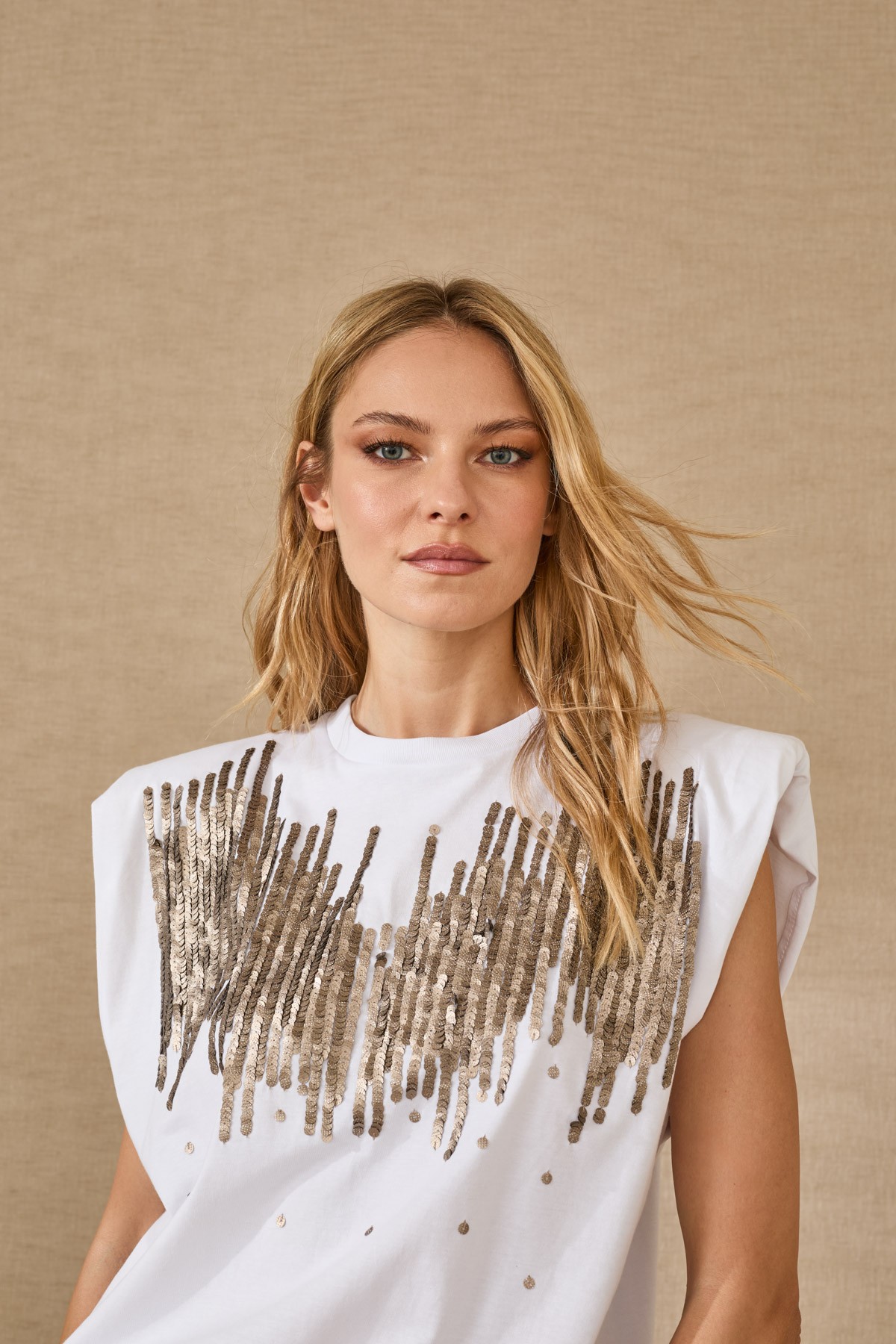 Βlouse with shoulder pads and embroidered sequins