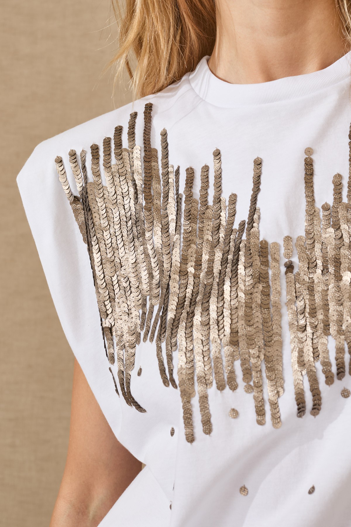 Βlouse with shoulder pads and embroidered sequins