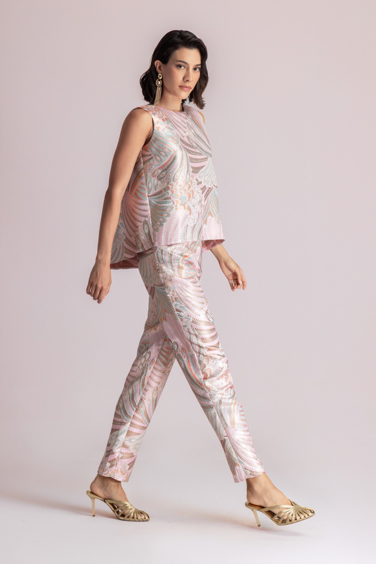 An asymmetrical metal shiny top.  Wear it with the matching pants.