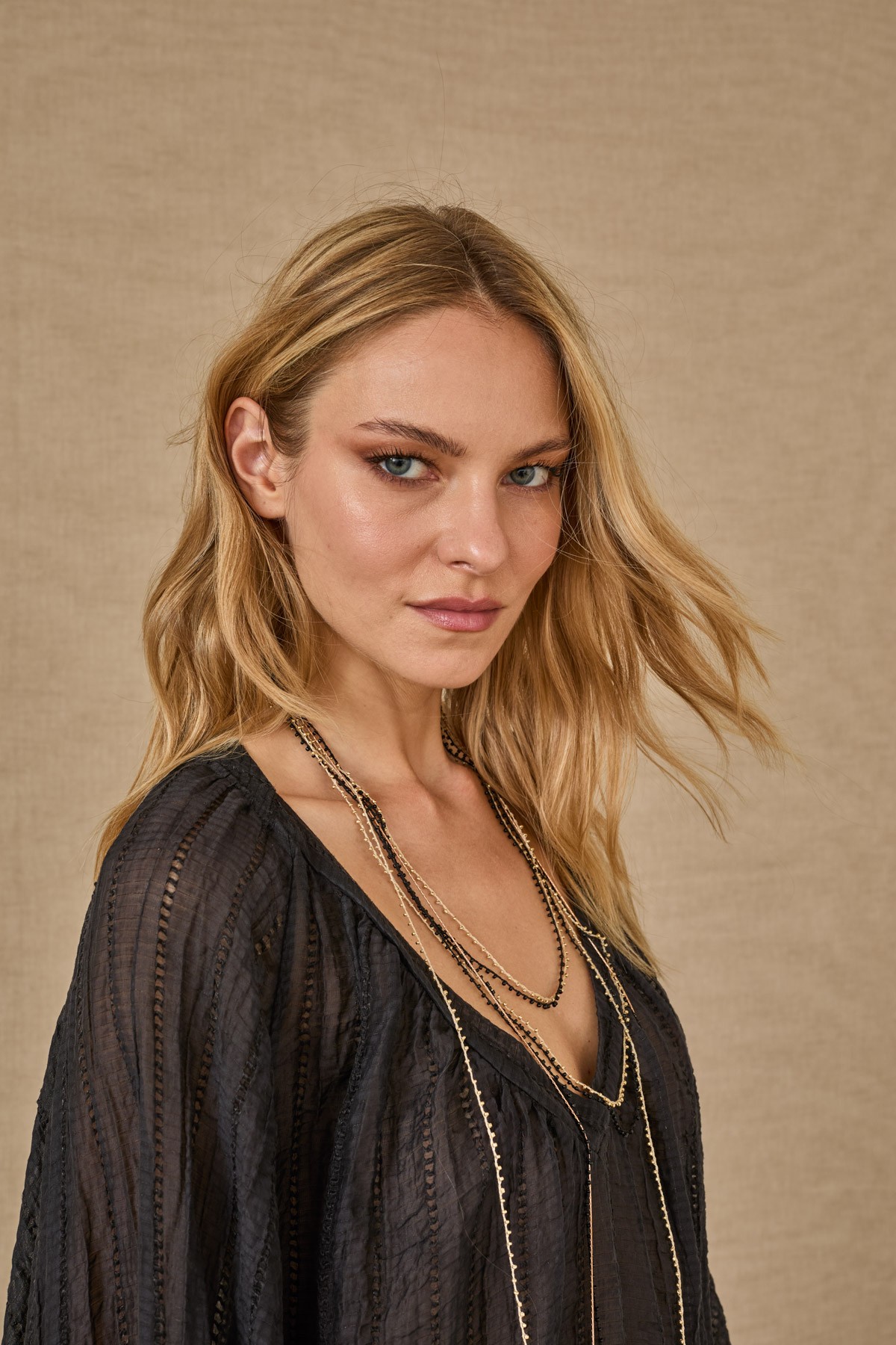 Light, flowy blouse with sleeves. For a complete look, pair them with the  pants from the same collection.