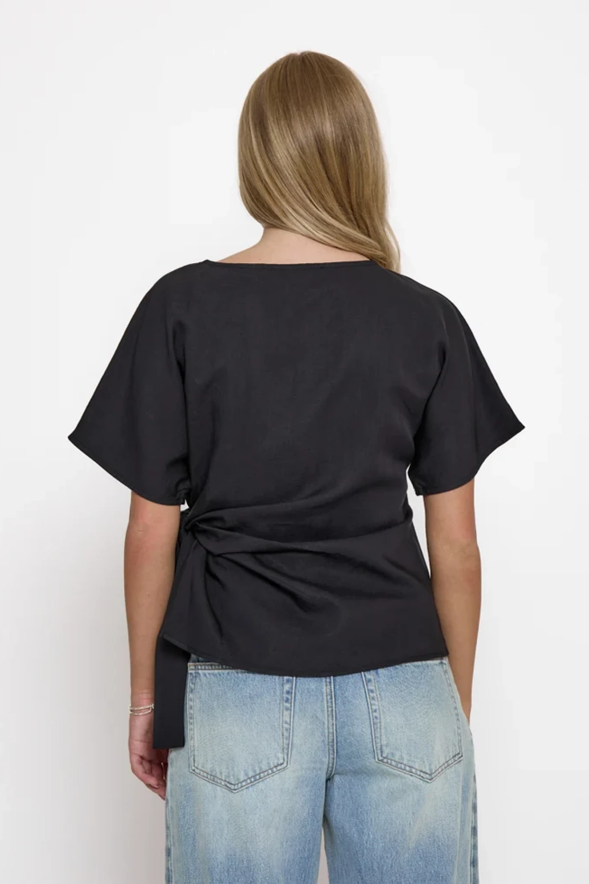 Asymmetrical wrap top with side knot