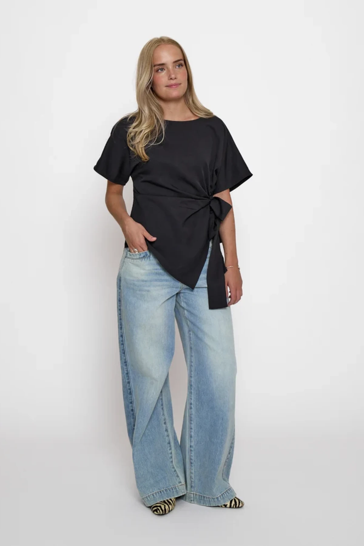Asymmetrical wrap top with side knot