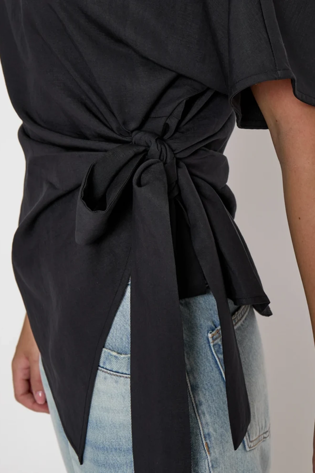 Asymmetrical wrap top with side knot
