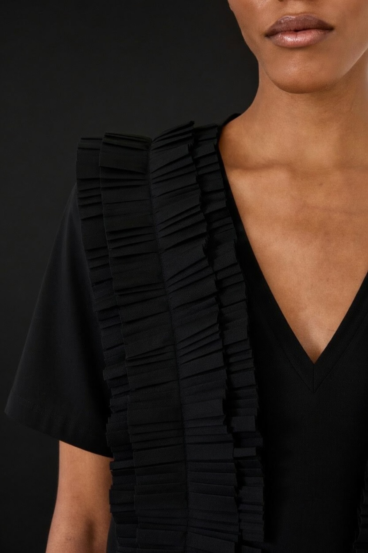 Short-sleeve statement blouse with a V-neck