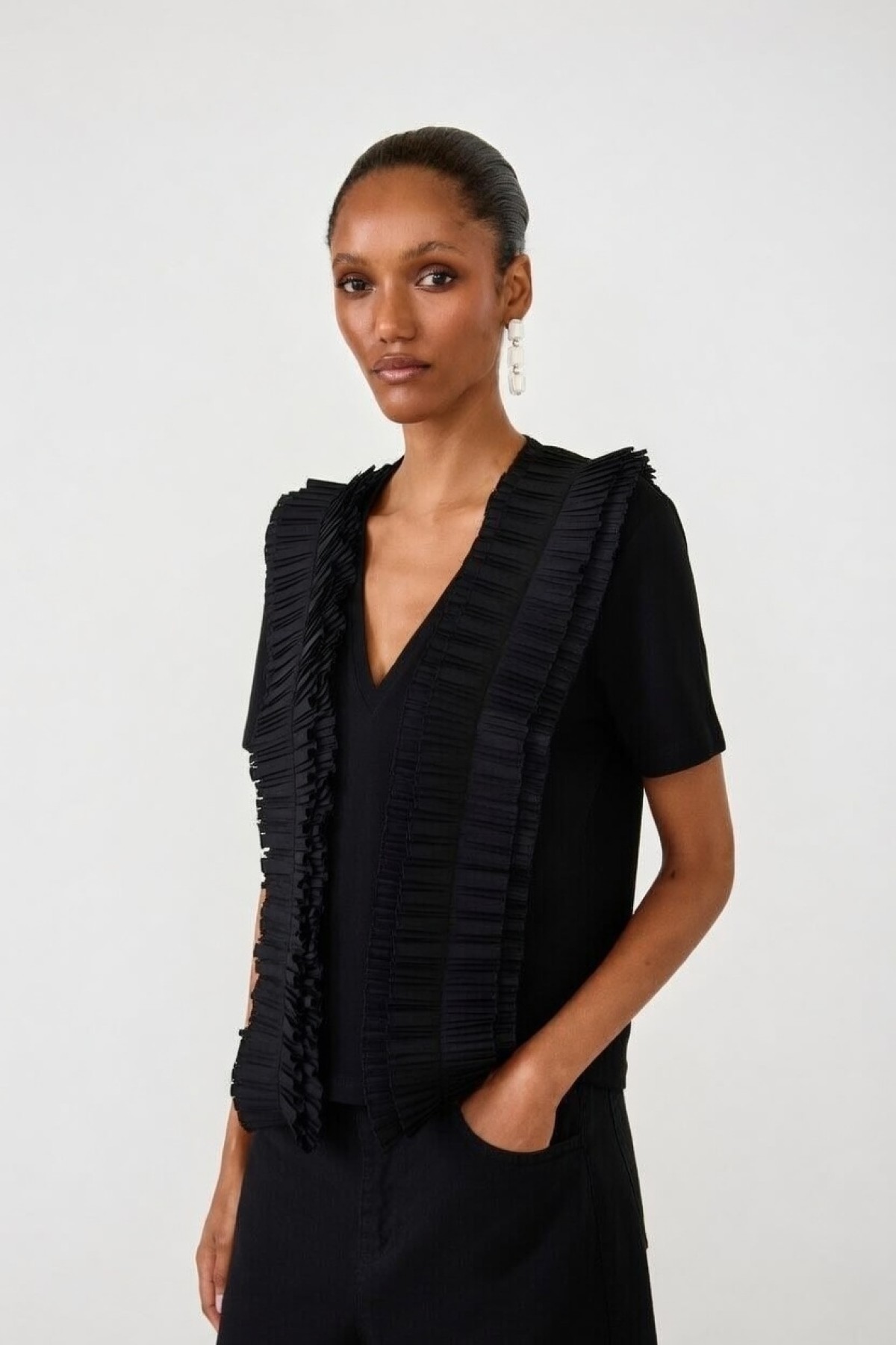 Short-sleeve statement blouse with a V-neck