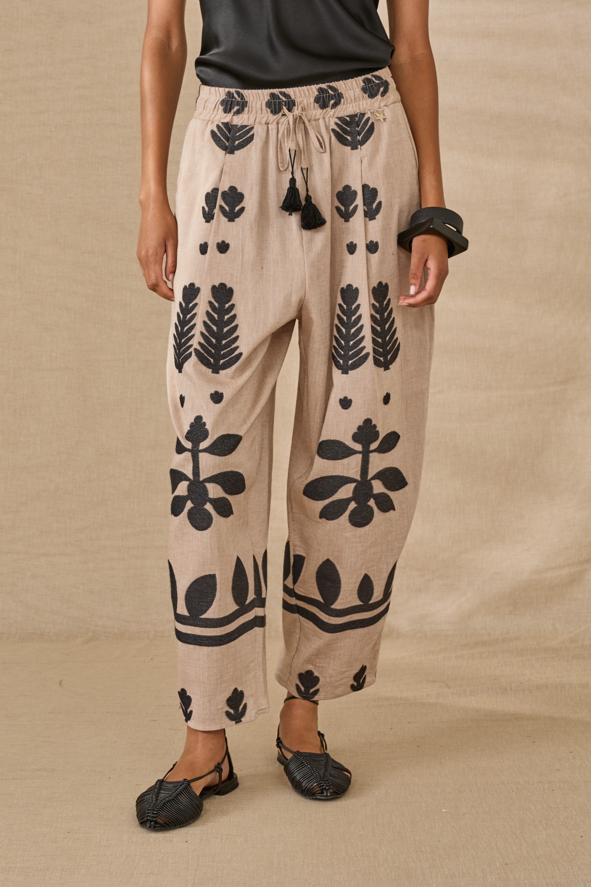 Comfortable fit pants with elastic waist band.  Wear it with the matching  top/vest