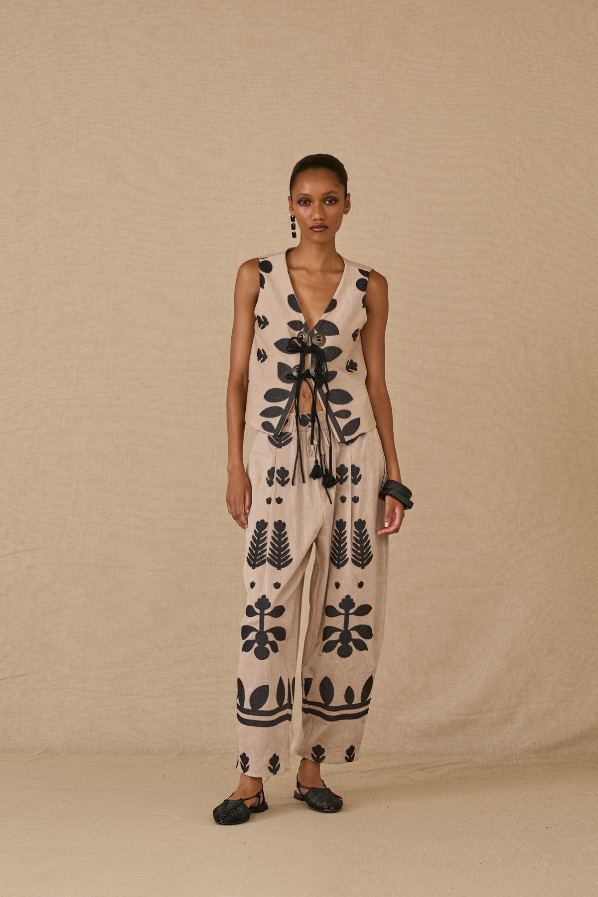 Comfortable fit pants with elastic waist band.  Wear it with the matching  top/vest