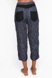 DENIM CROPPED PANTS WITH BLACK FABRIC DETAILS