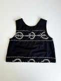Sleeveless top with  white embroidery, wear it with the matching pants.