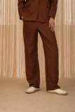 Wide-leg pants with elastic waist.  For a complete look, pair them with the blazer from the same collection.