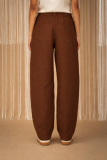 Wide-leg pants with elastic waist.  For a complete look, pair them with the blazer from the same collection.