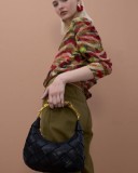 Woven Bag with metallic Leopard Handle.