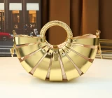 Metallic gold crossbody handbag