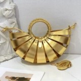 Metallic gold crossbody handbag