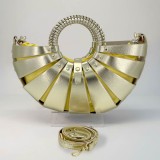 Metallic gold crossbody handbag