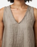 V-neck top with sleeveless.  Wear it with the matching pants