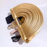 Metallic gold handbag