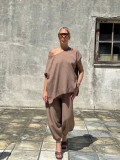 Pants 95% cotton 5% elastane.  For a complete look, pair them with the top from the same collection.