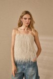 A striking fringed top.