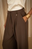 Pleated wide-leg pants.  For a complete look, pair them with the blazer from the same collection.